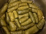 Freshly rolled dolmades ready for cooking - Athens Cooking Lessons